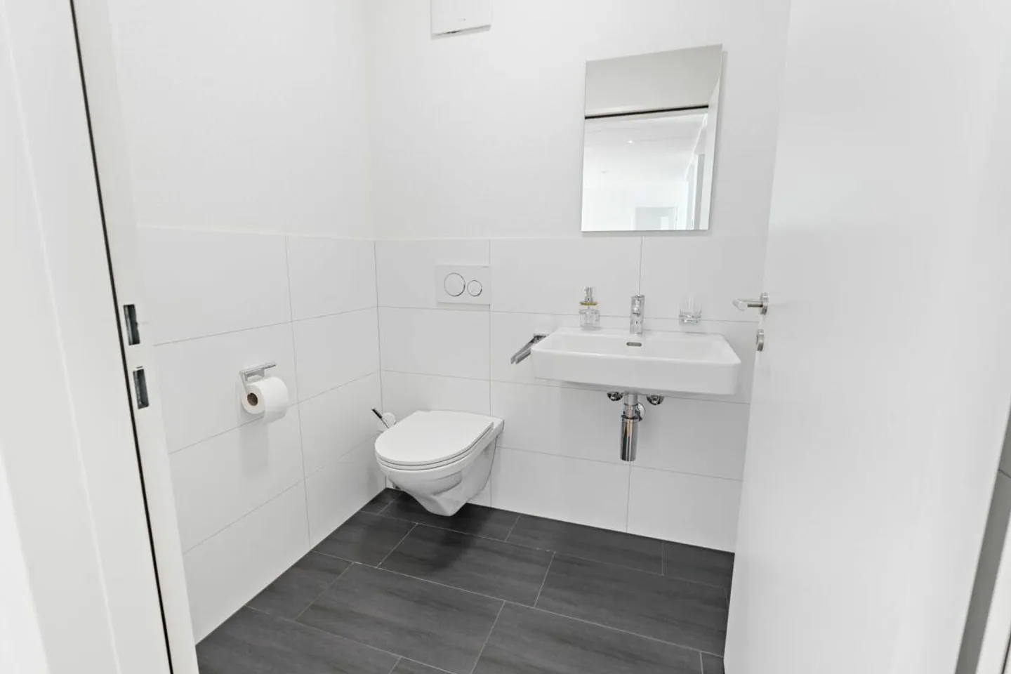 Appartement de jardin moderne et ensoleillé de 3,5 pièces - Photo 7 sur 11