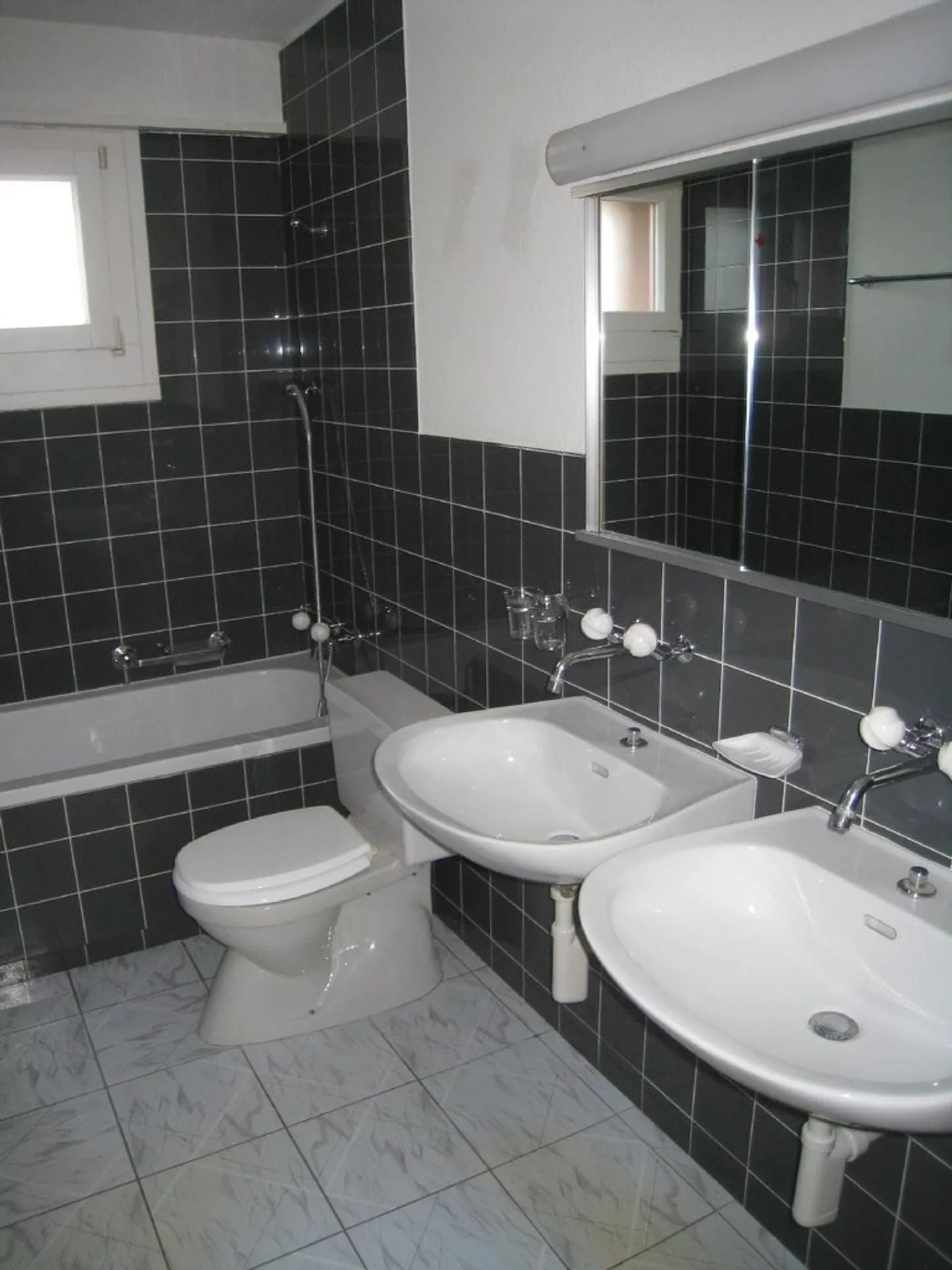 Appartement spacieux 4 pièces - Photo 11 sur 12