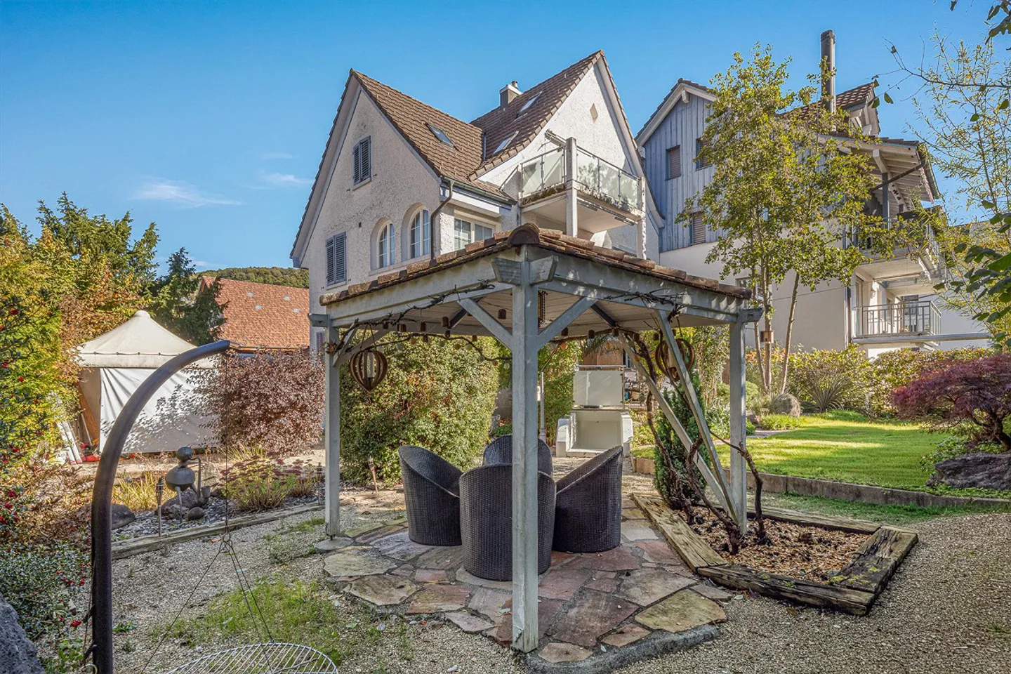 Charmante maison à trois familles avec jardin et potentiel d'extension - Photo 2 sur 14