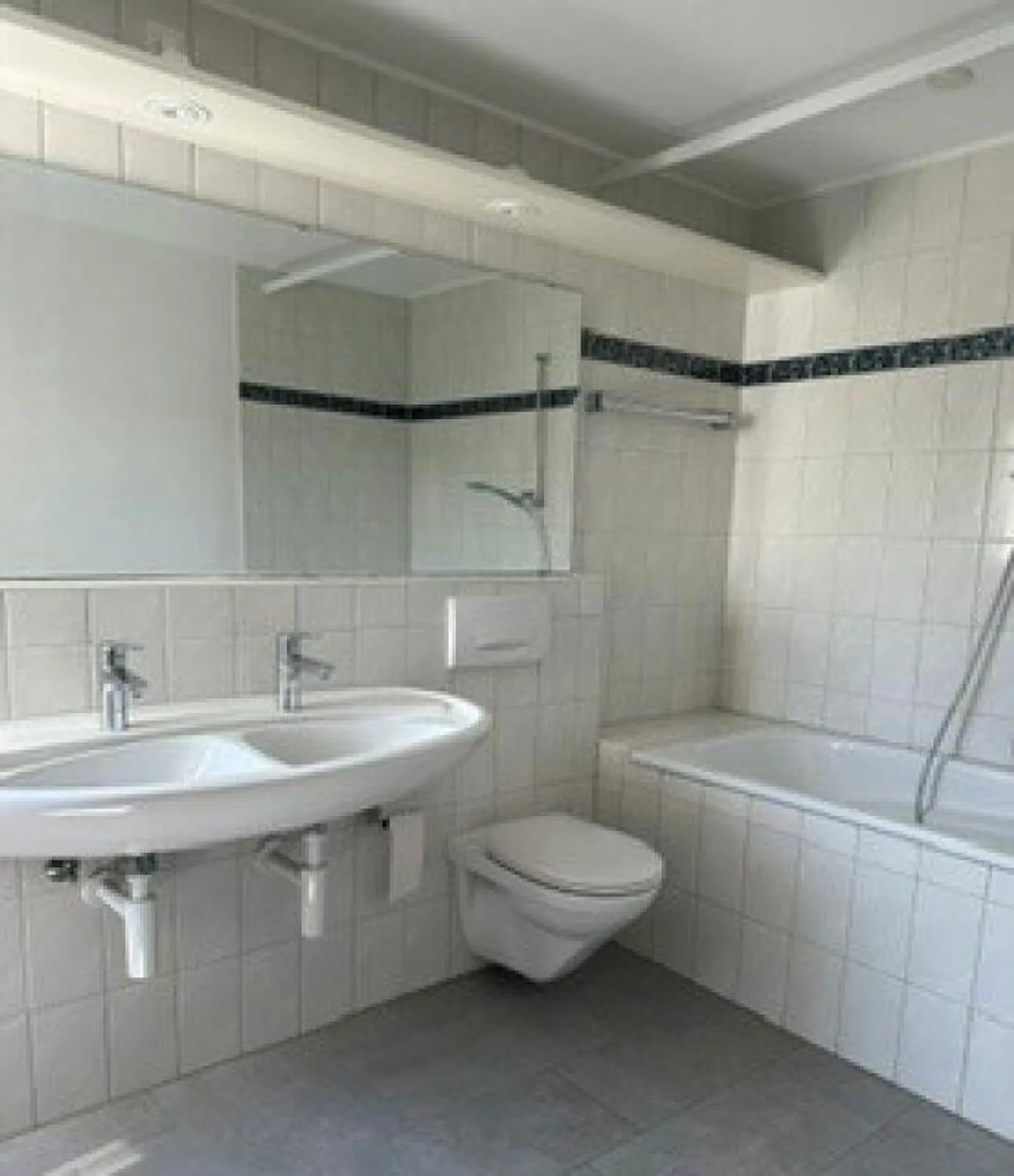 Appartement en duplex de 3,5 pièces - Photo 3 sur 12