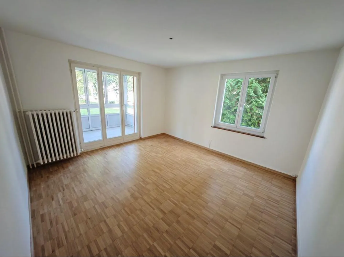 Charmante appartement en mezzanine dans le vert, juste à côté de Triemli/In der Ey - Photo 3 sur 9