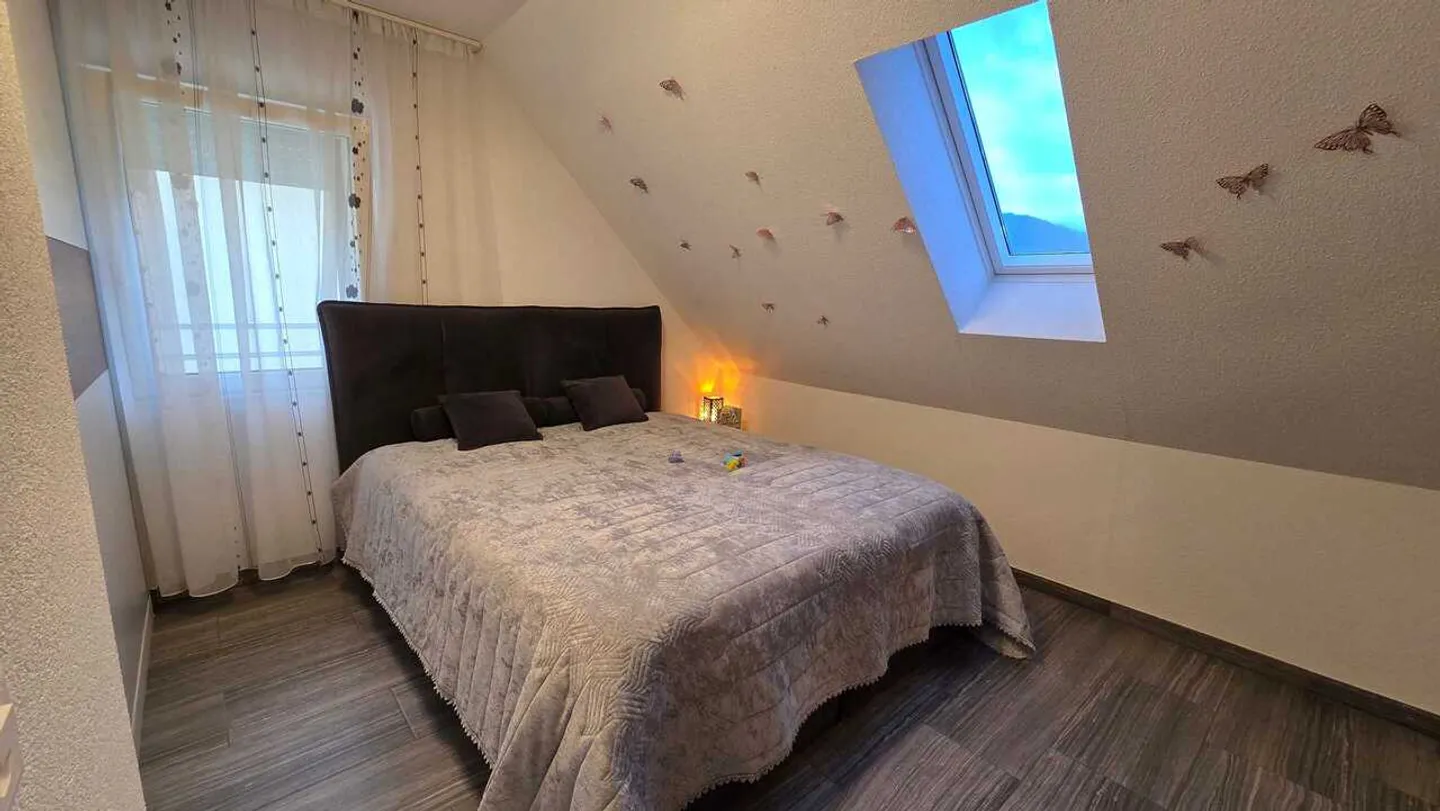 Maison de 3 familles rénovée avec un rendement de 4,6 % - Photo 5 sur 9