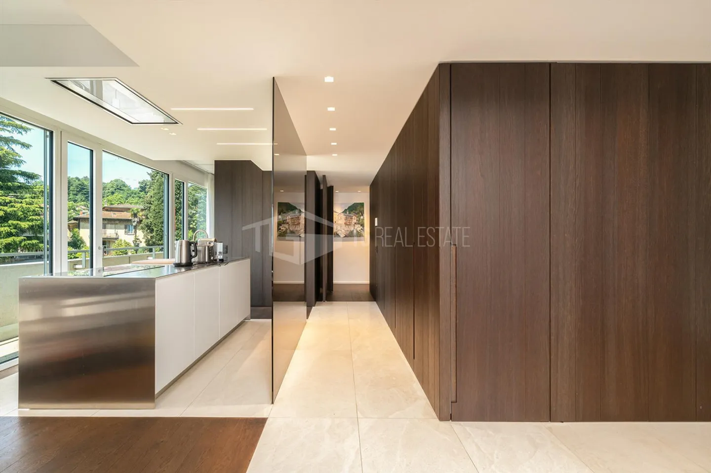 PENTHOUSE ÉLÉGANT AU 12E ÉTAGE AU CŒUR DE LUGANO - Photo 4 sur 13
