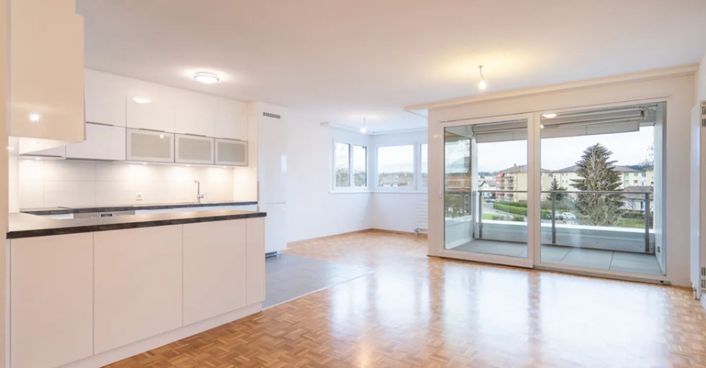 Charmant appartement 3.5 pièces - Photo 2 sur 7