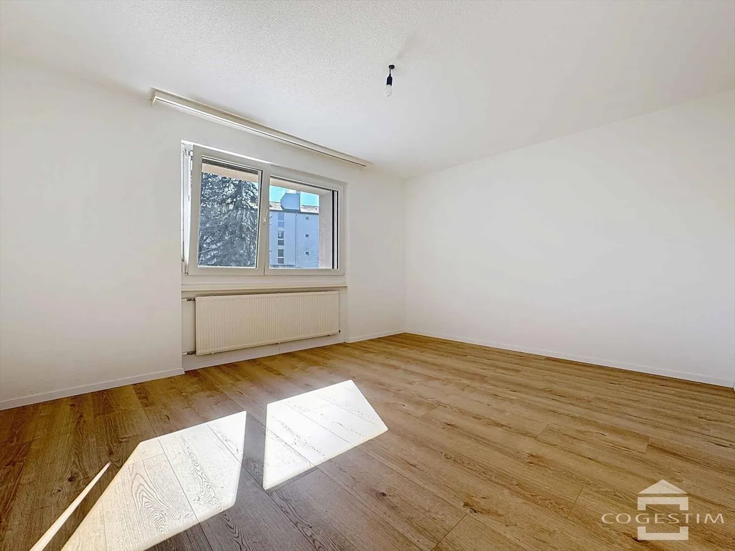 Appartement 4.5 pièces - Photo 4 sur 13