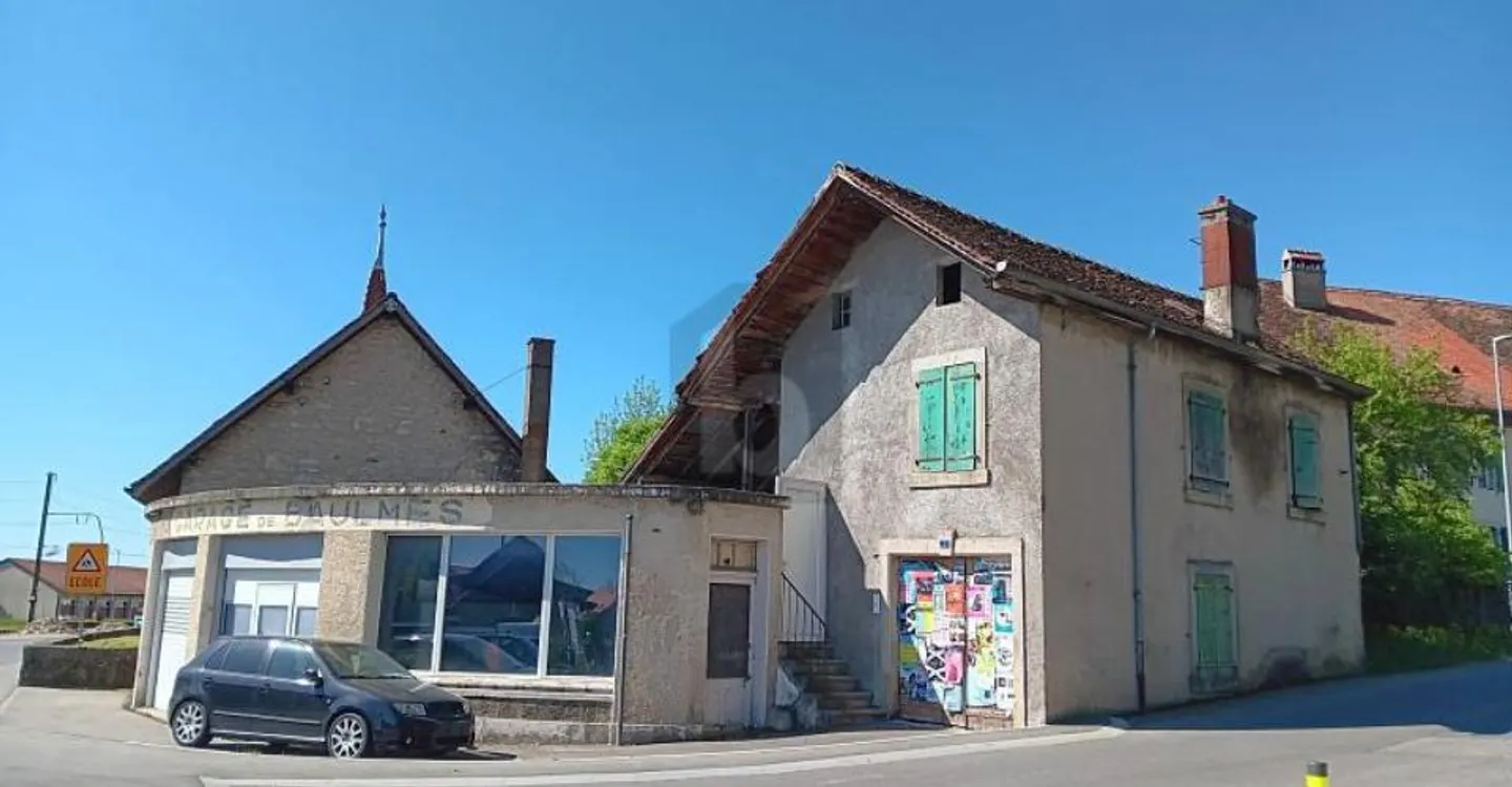 VERSATILE POTENTIAL IN THE HEART OF THE VILLAGE - Photo 1 of 6