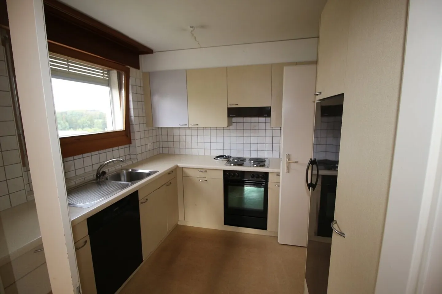 Appartement Charmant avec Vue Jardin - Photo 7 sur 13