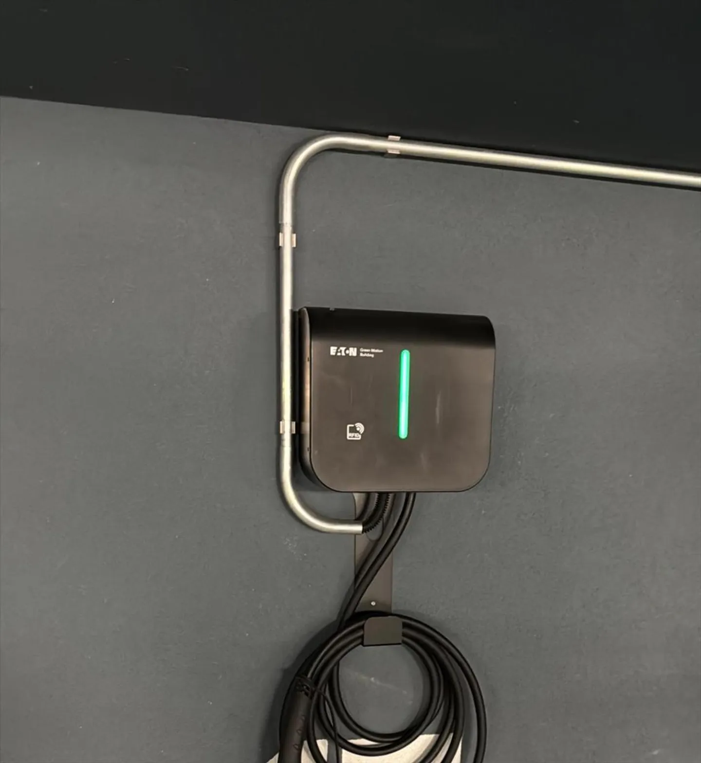 Tenant parking space with charging station for electric vehicles - Photo 1 of 3