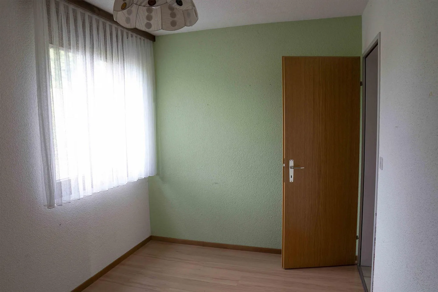 Appartamento 4,5 locali al 1° piano con balcone + 2 posti auto - Foto 3 di 31