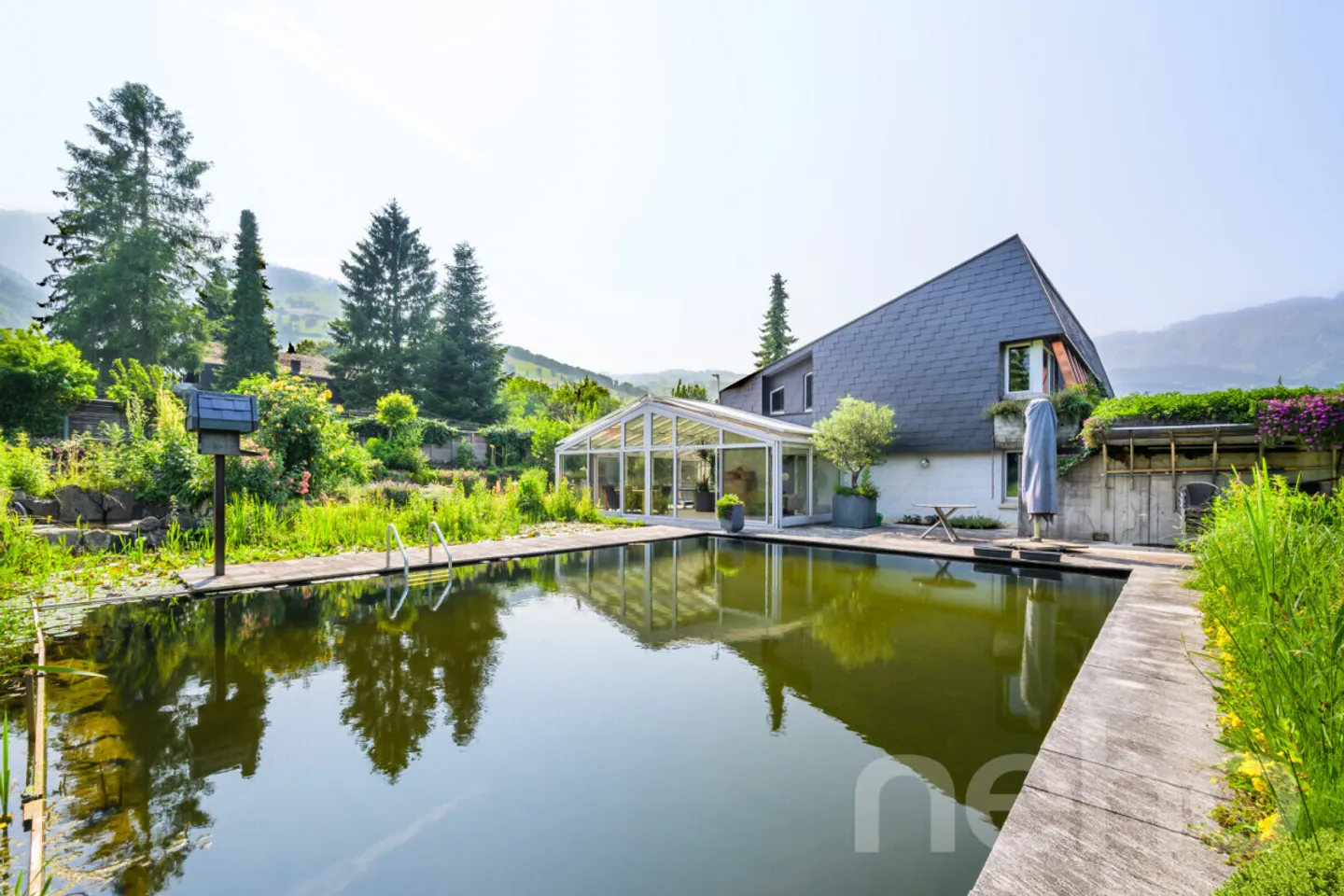Esclusiva casa unifamiliare a Grabs con piscina naturale e vista in posizione privilegiata - Foto 1 di 13