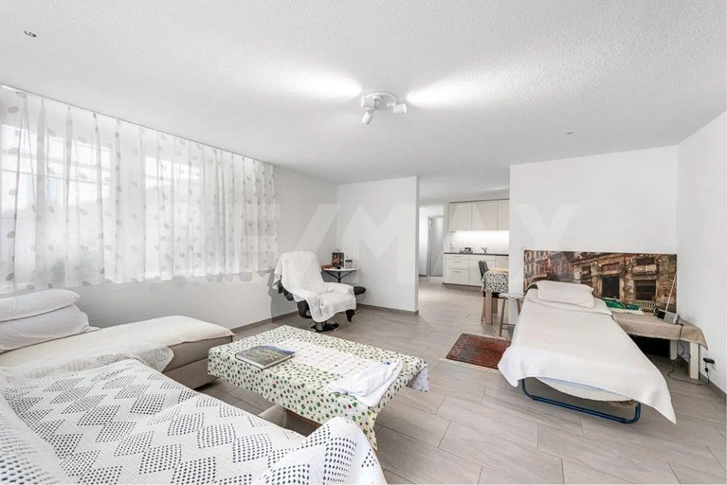 Mehrfamilienhaus mit drei Wohnungen und Baulandreserve - Foto 4 von 13