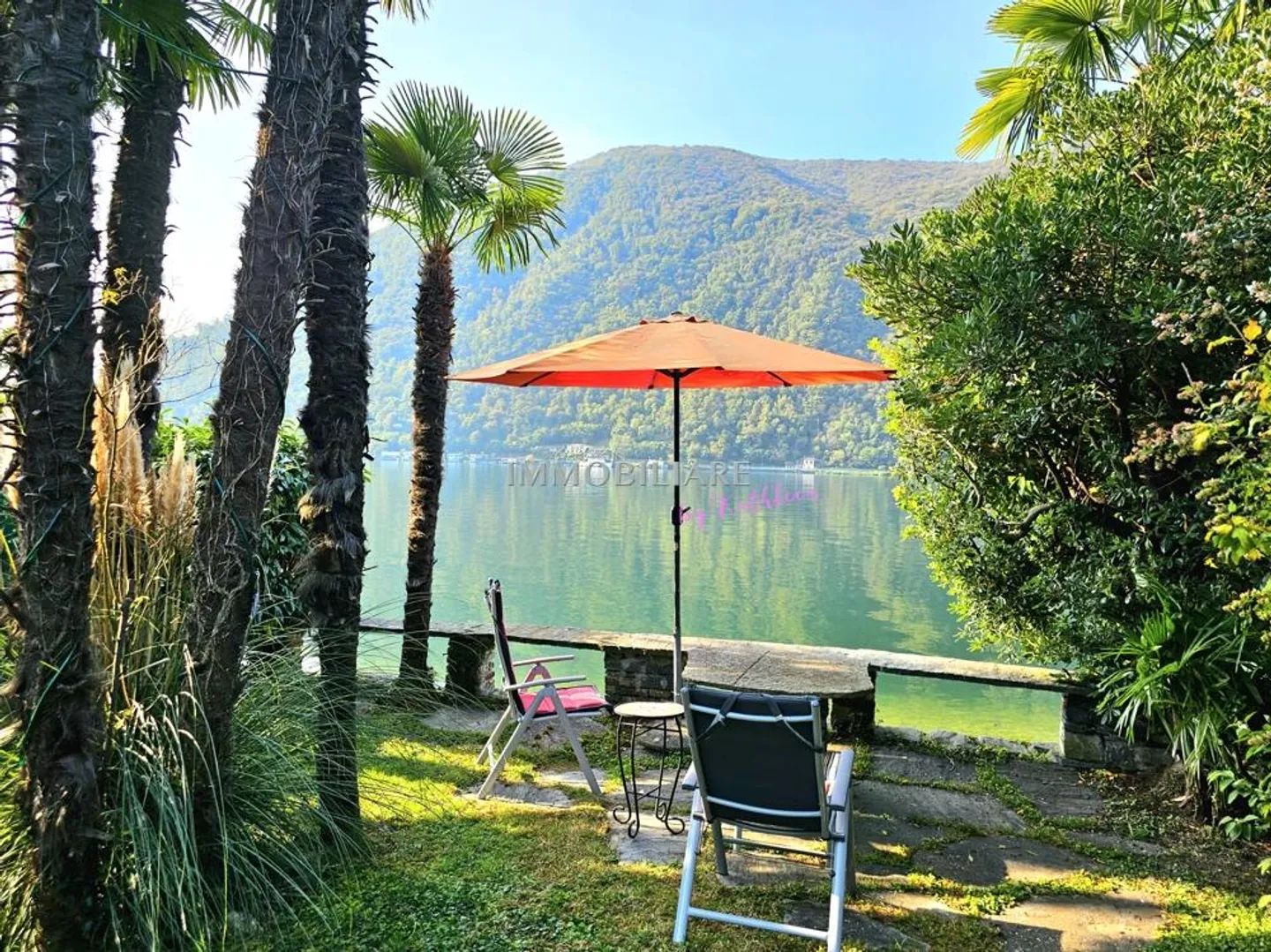 Rarität: Ferienhaus mit Bootshaus und eigenem Seezugang - Foto 1 von 16