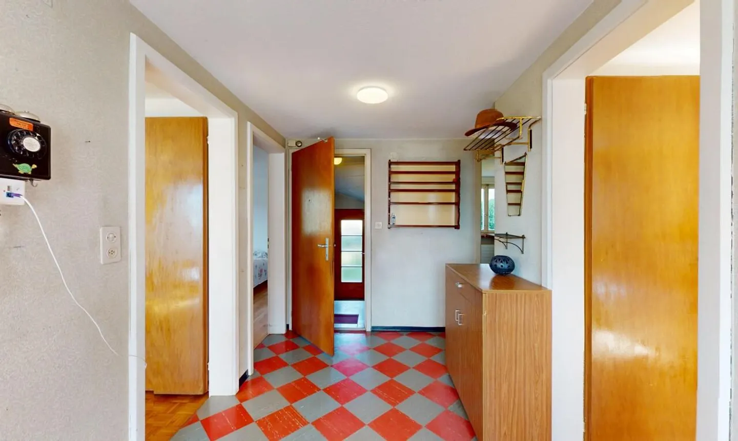 Charmante maison bifamiliale avec grand espace extérieur et beaucoup de potentiel - Photo 7 sur 13