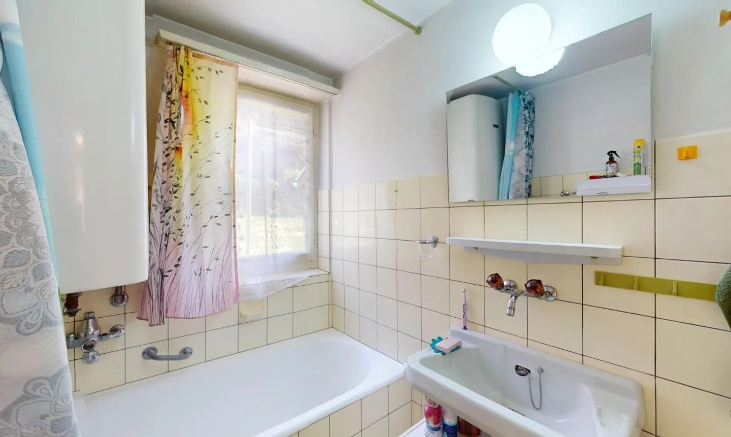 Charmante maison bifamiliale avec grand espace extérieur et beaucoup de potentiel - Photo 9 sur 13