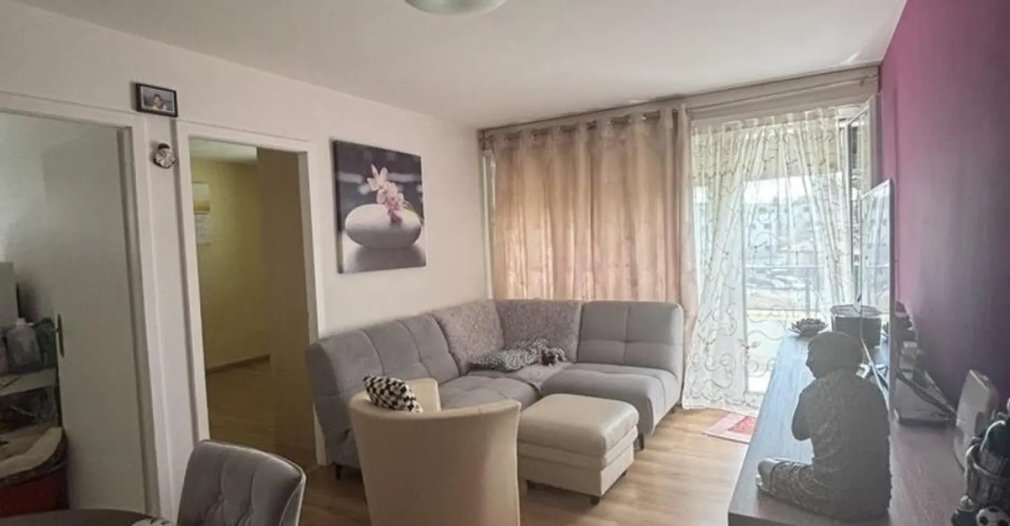 Appartement Charmant dans Quartier Calme - Photo 2 sur 7