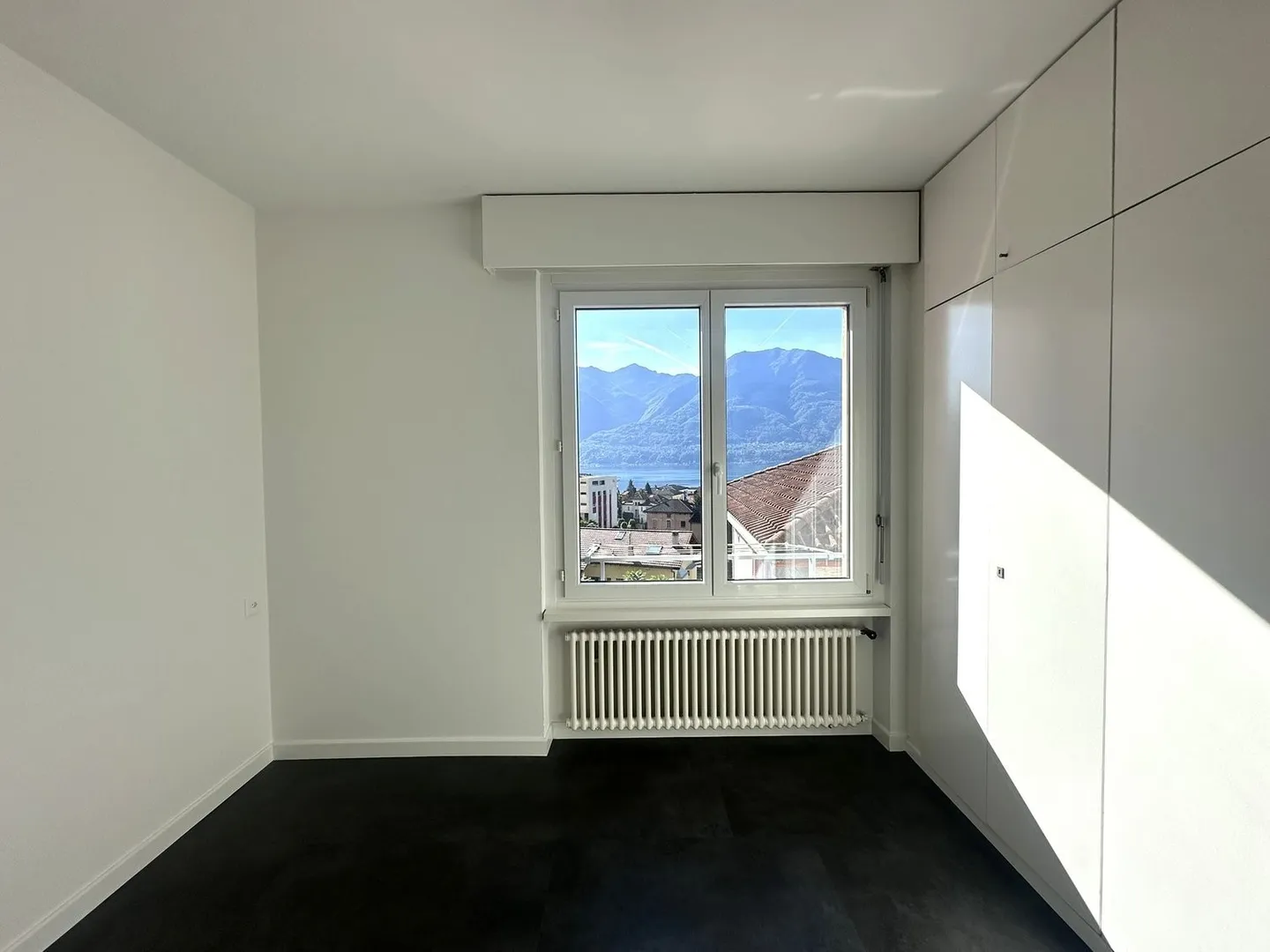 3 ½ pièces avec vue sur le lac à Muralto - Photo 11 sur 21