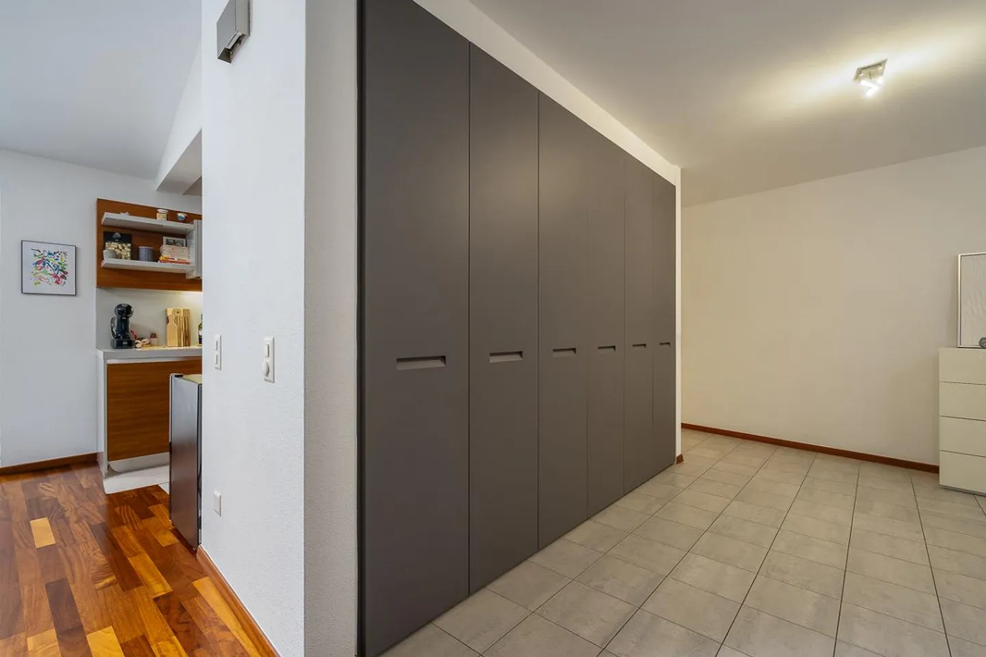 Exclusive Renovated Apartment with Private Garden in the Historic Heart of Caslano - Photo 6 of 13