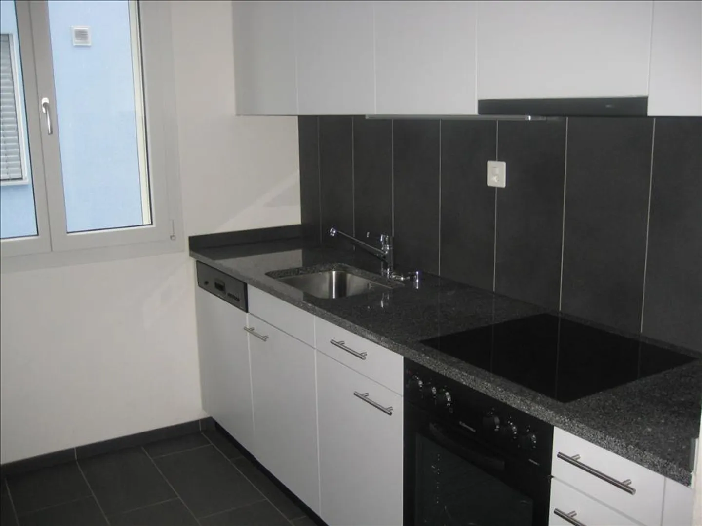 Appartement ensoleillé avec coin jardin - Photo 2 sur 6