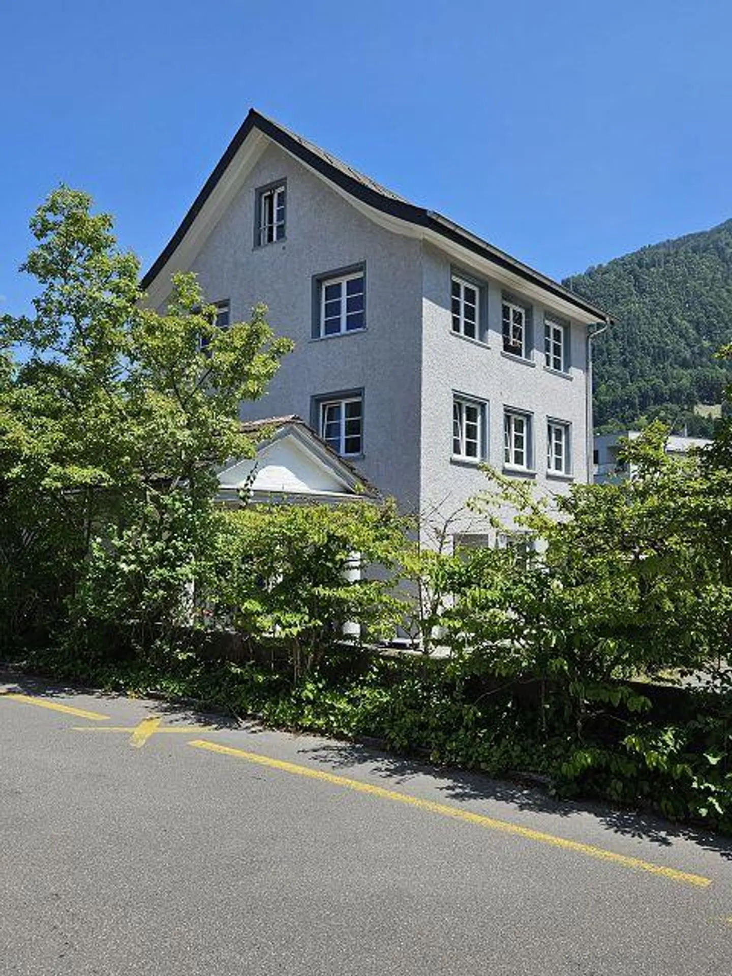 Appartement de 2,5 pièces au rez-de-chaussée avec patio - Photo 1 sur 6