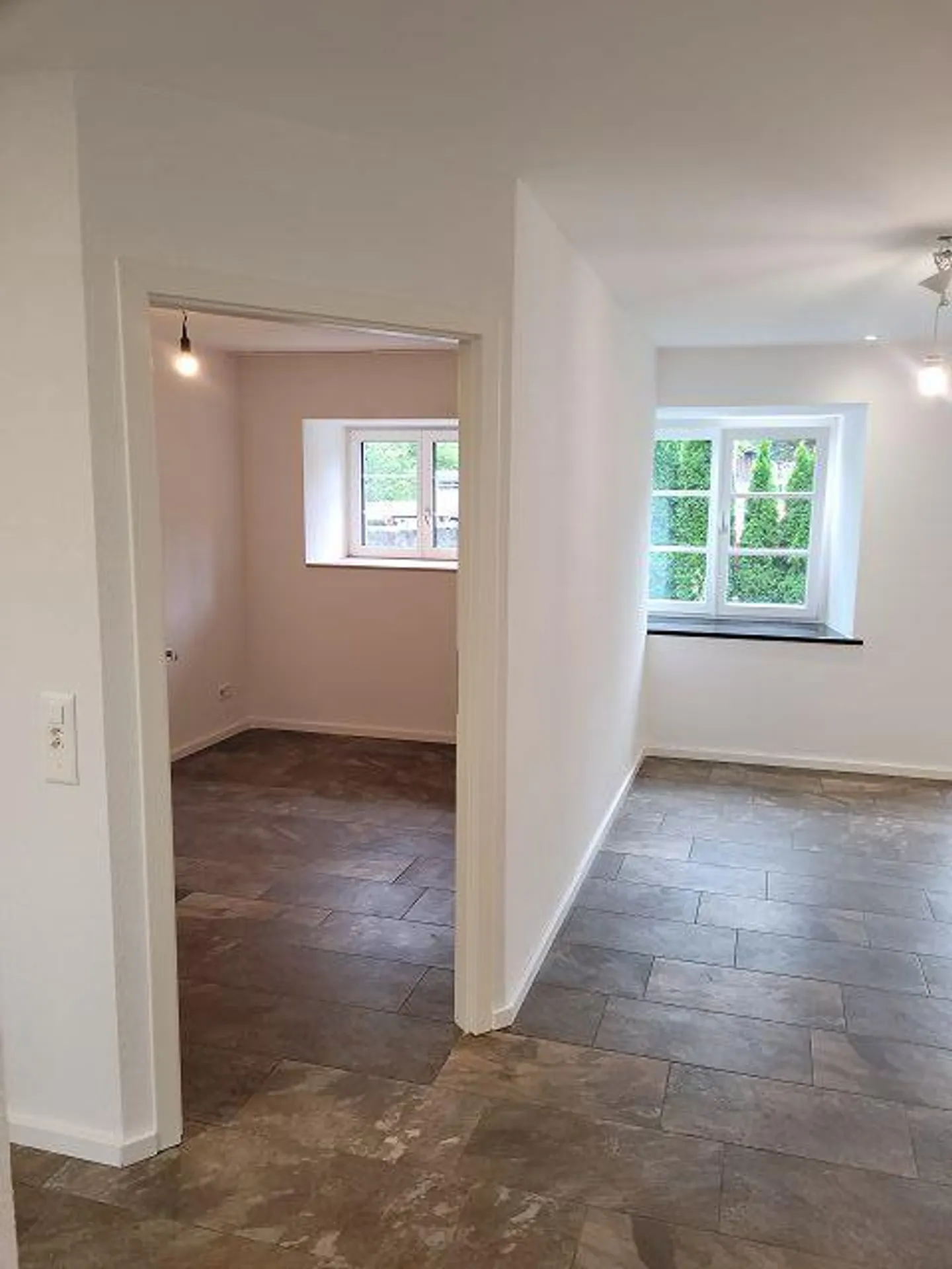 Appartement de 2,5 pièces au rez-de-chaussée avec patio - Photo 5 sur 6