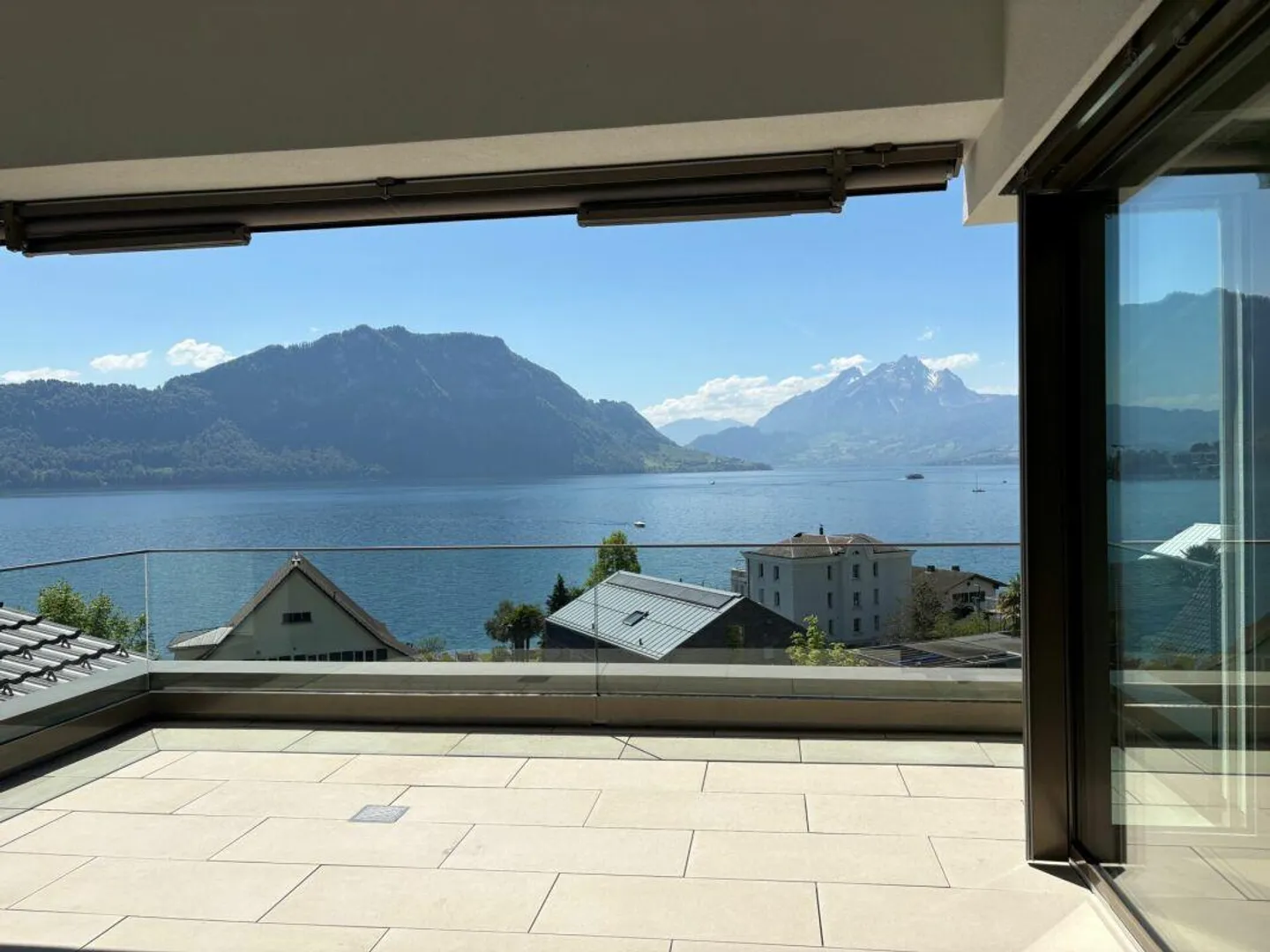 Exclusive penthouse apartment with unique lake and mountain views - Photo 1 of 15