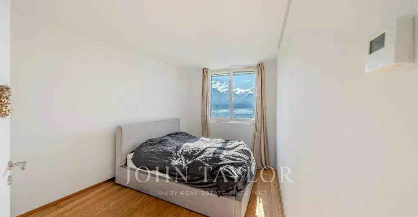 Villa contemporaine avec vue sur le lac - Photo 7 sur 13