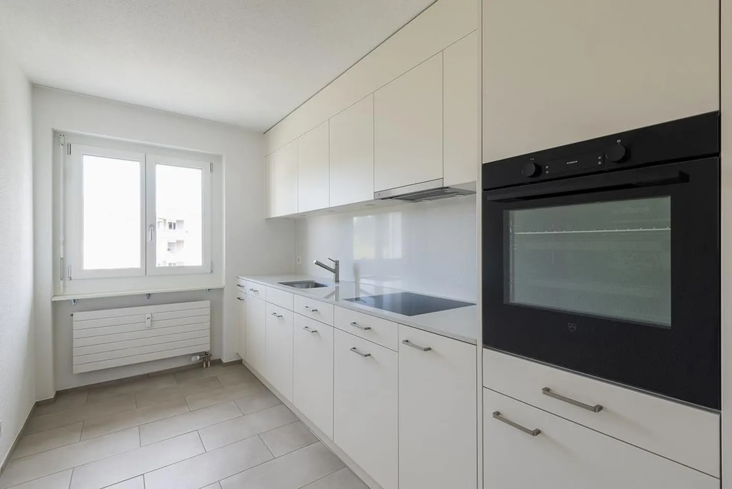 Frisch sanierte 4-Zimmerwohnung mit Sitzplatz und Waschturm - Foto 1 von 7