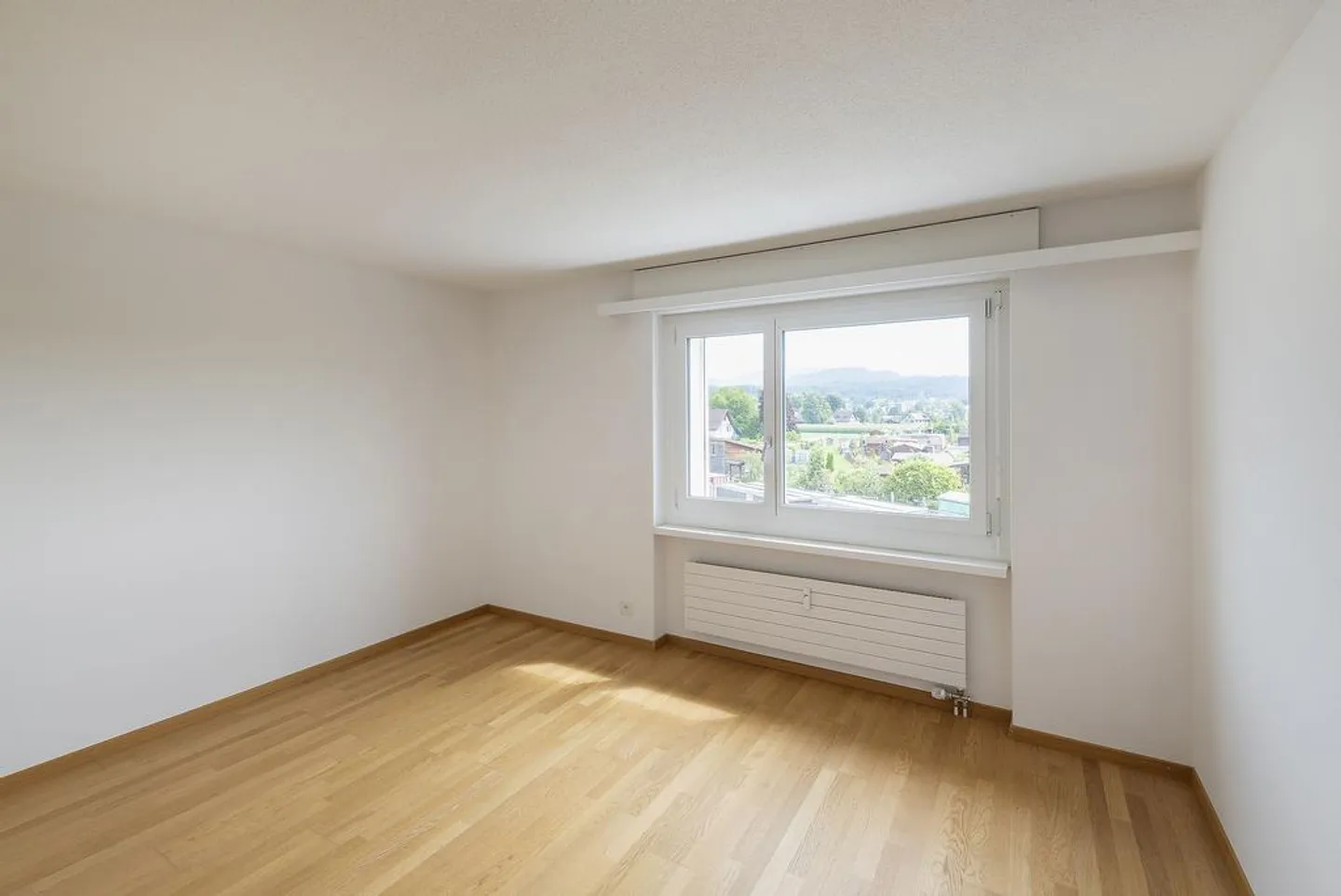 Frisch sanierte 4-Zimmerwohnung mit Sitzplatz und Waschturm - Foto 7 von 7