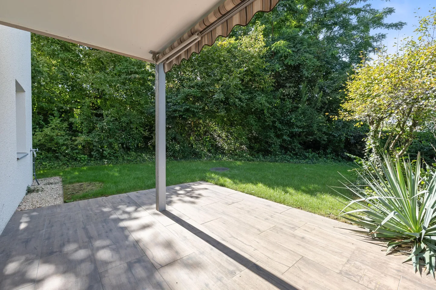 Appartamento con giardino 3,5 locali in un quartiere tranquillo senza traffico di transito - Foto 1 di 8