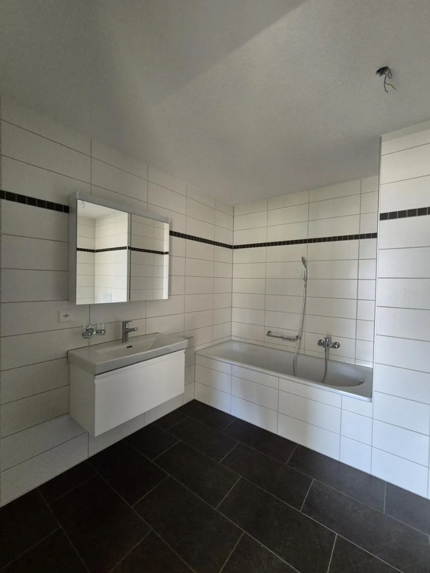 Appartement spacieux 4,5 pièces - Photo 10 sur 11