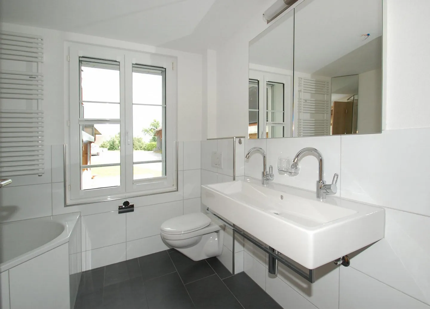 Appartement ensoleillé de 4½ pièces avec espace jardin - Photo 6 sur 14