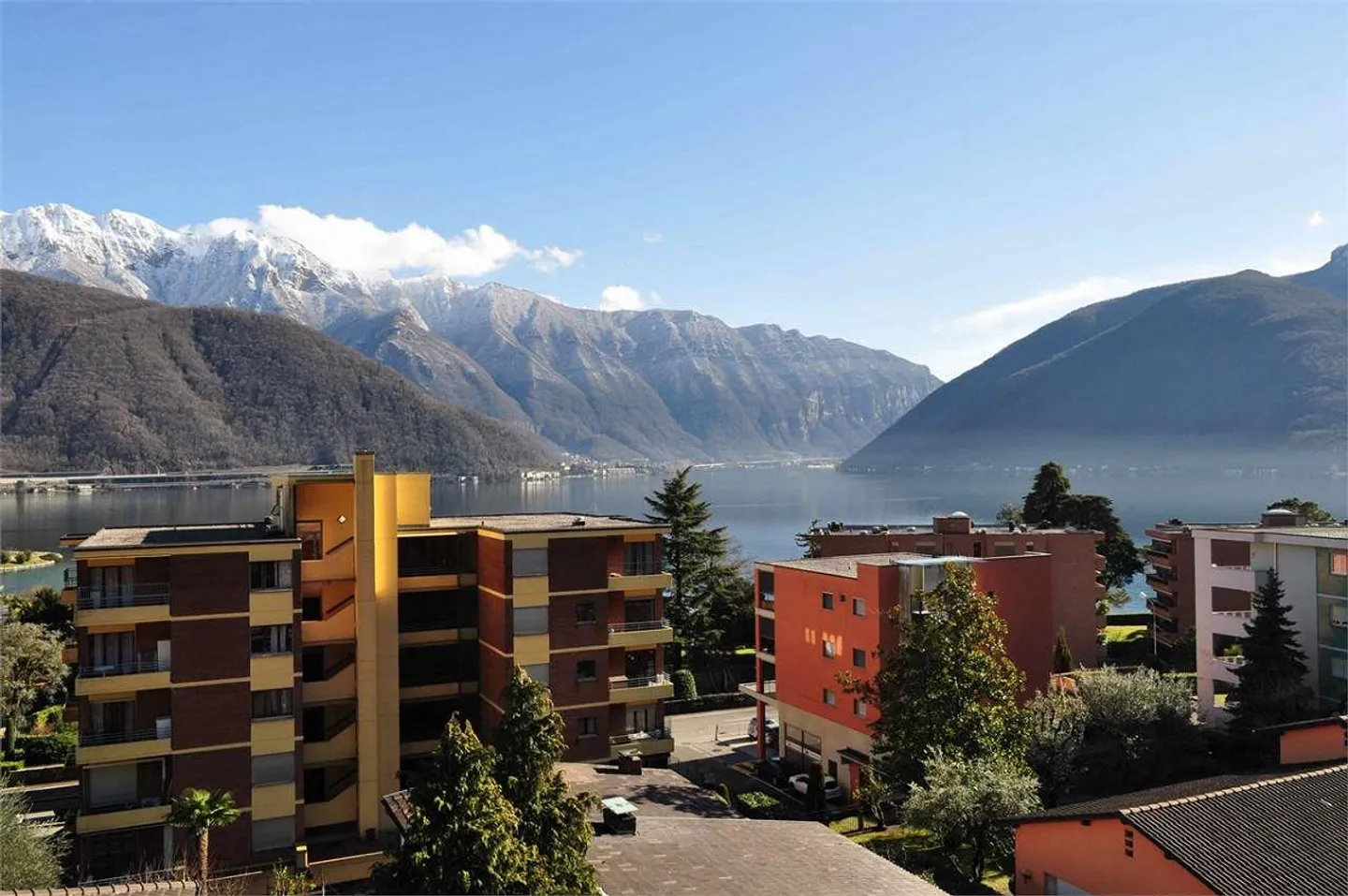 Moderno app. di 4.5 loc. con vista lago e roof-top - Foto 1 di 13