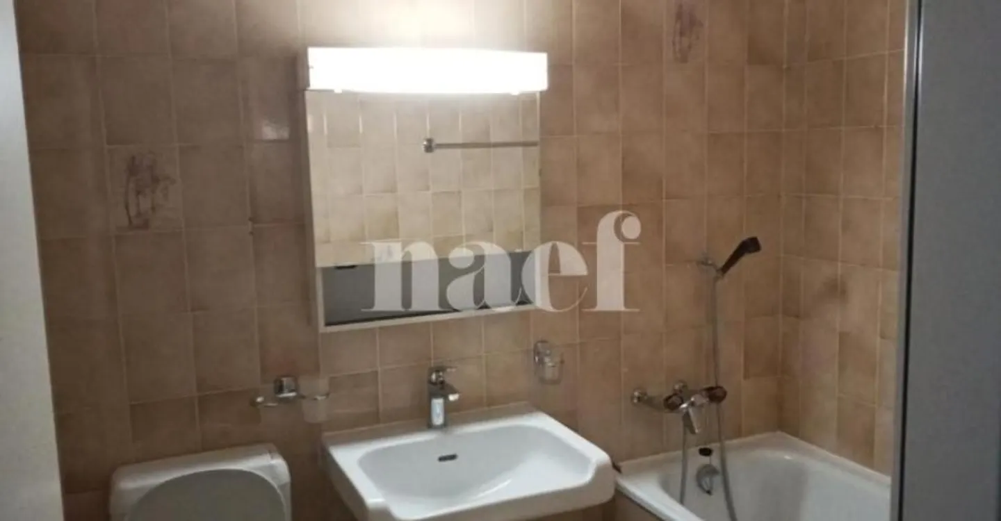 Appartement Charmant avec Balcons - Photo 6 sur 8