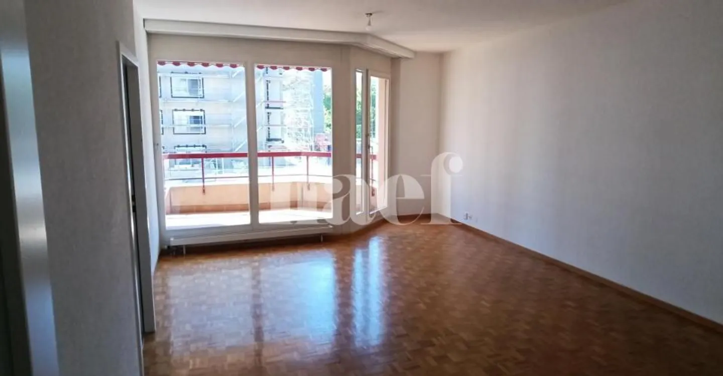 Appartement Charmant avec Balcons - Photo 4 sur 8