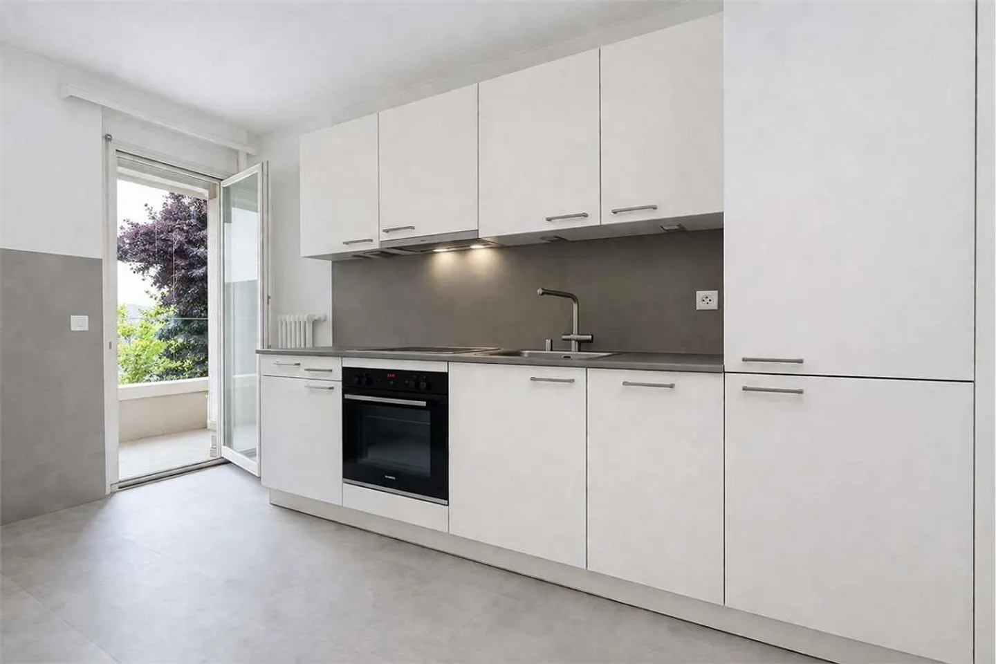 3.5 pièces dans un bâtiment rénové à Massagno - Photo 2 sur 9