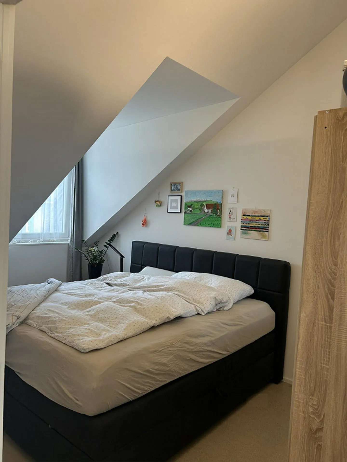 Luminoso appartamento mansardato di 3,5 locali con balcone e posto auto - Foto 8 di 9