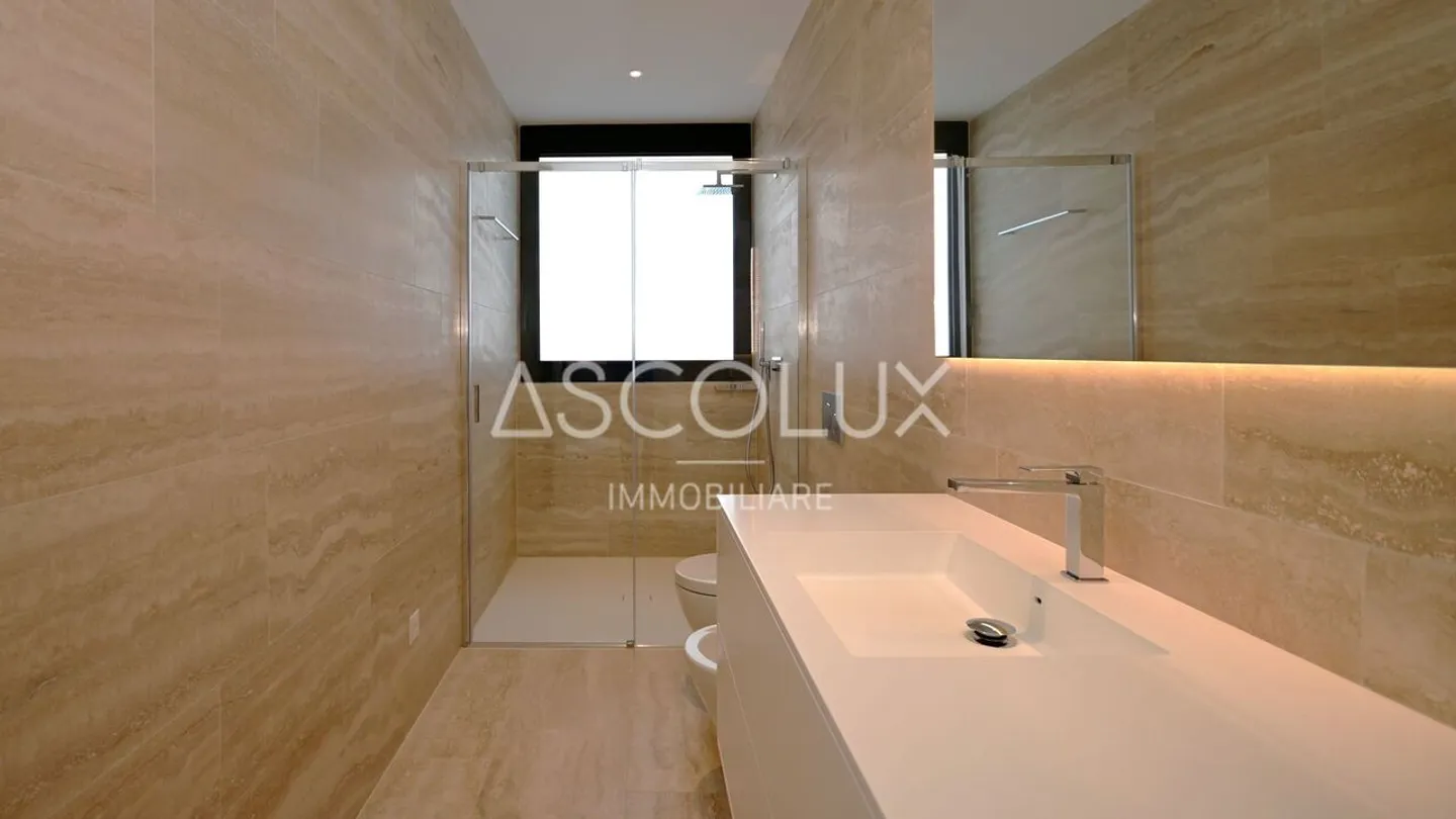 Modern 2.5-room apartment in residence with heated outdoor pool and sauna - Photo 10 of 13