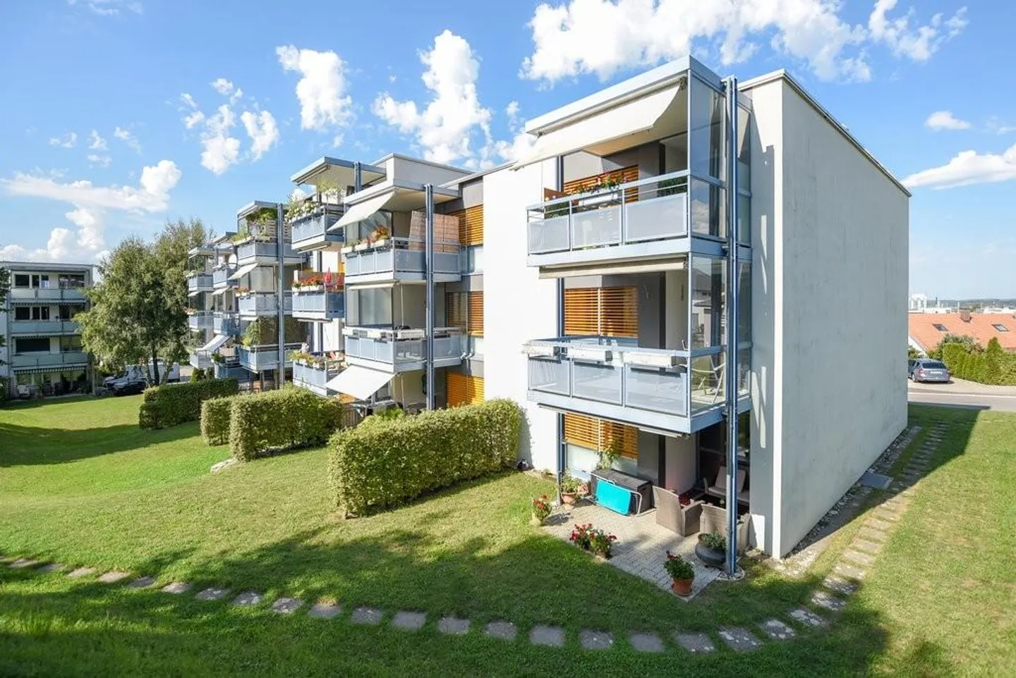 Incantevole appartamento di 2,5 stanze con patio - Foto 1 di 5