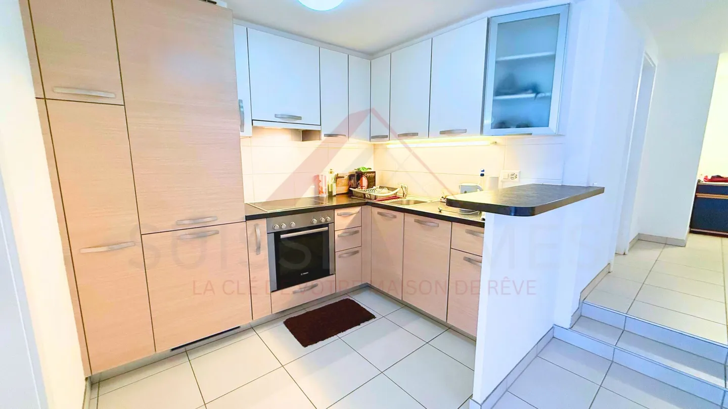 Appartement 2.5 pièces moderne au centre d'Aigle - idéal habitation ou investissement - Photo 5 of 7