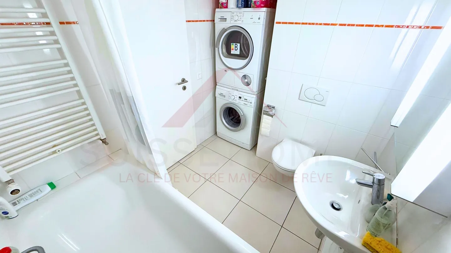 Appartement 2.5 pièces moderne au centre d'Aigle - idéal habitation ou investissement - Photo 7 of 7