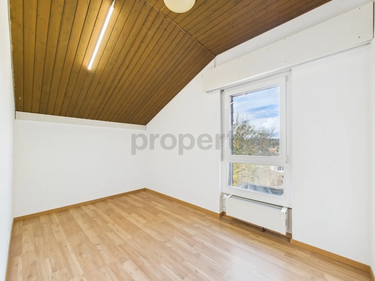 Appartement sous les combles avec charme et confort - Photo 6 sur 10