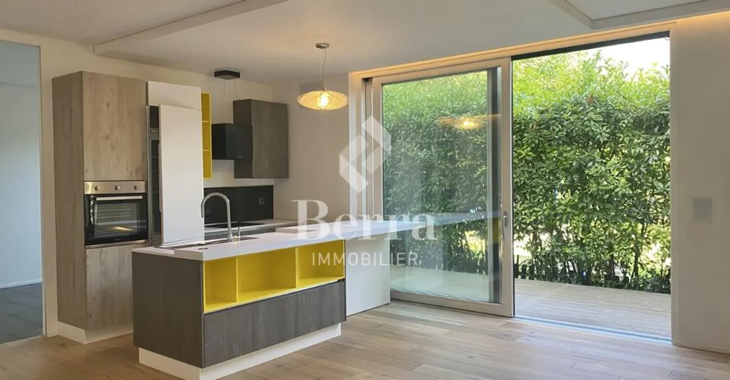 3.5-room apartment of 75 m² – Garden-level with terrace - Photo 5 of 11