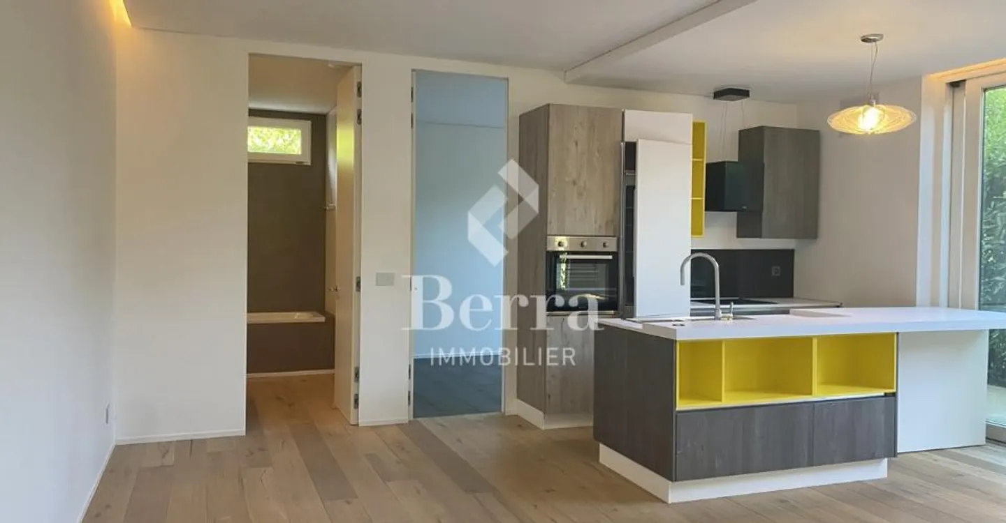 3.5-room apartment of 75 m² – Garden-level with terrace - Photo 6 of 11