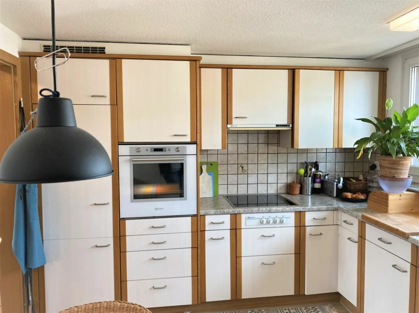 Cozy 3.5-room attic apartment in the heart of Hauptwil - Photo 2 of 16