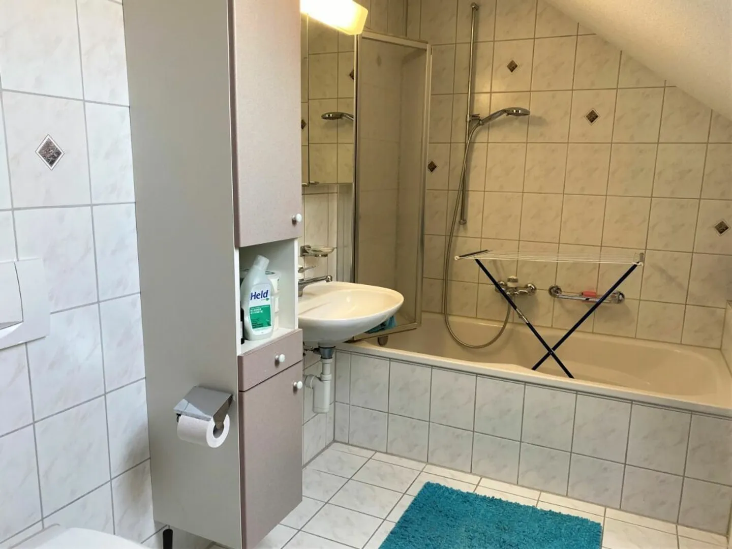 Cozy 3.5-room attic apartment in the heart of Hauptwil - Photo 9 of 16