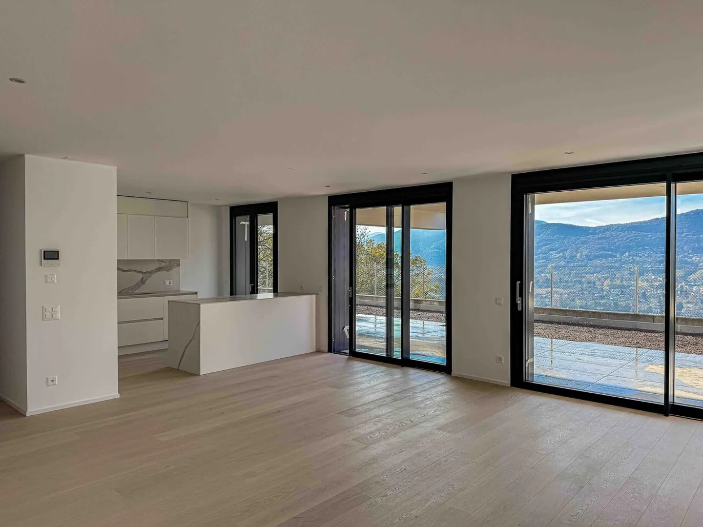 Neue 2.5-Zimmer-Wohnung mit Seeblick und Garten in Montagnola - Foto 1 von 6