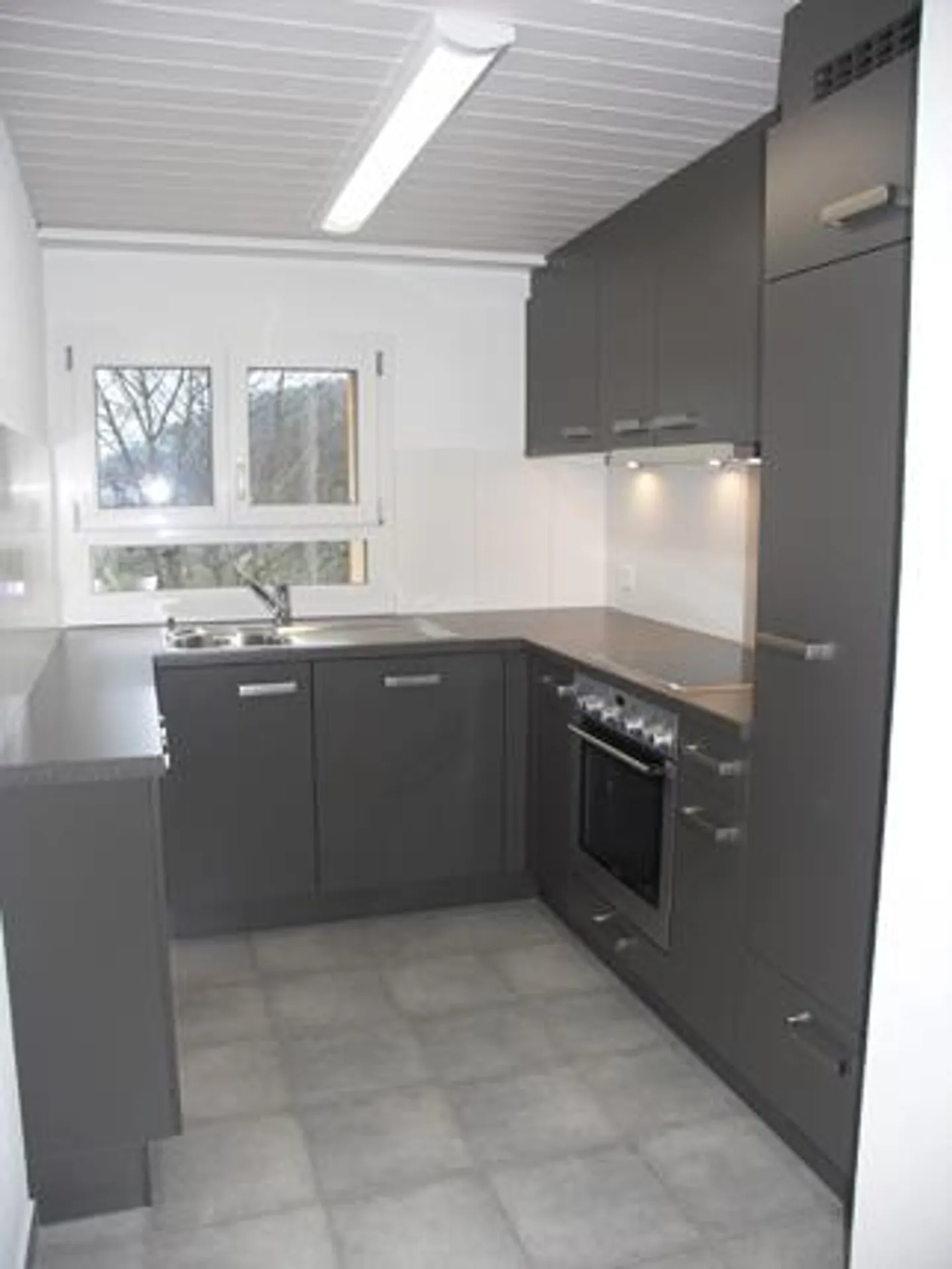 Appartement sous les combles de 3,5 pièces confortable - Photo 4 sur 8