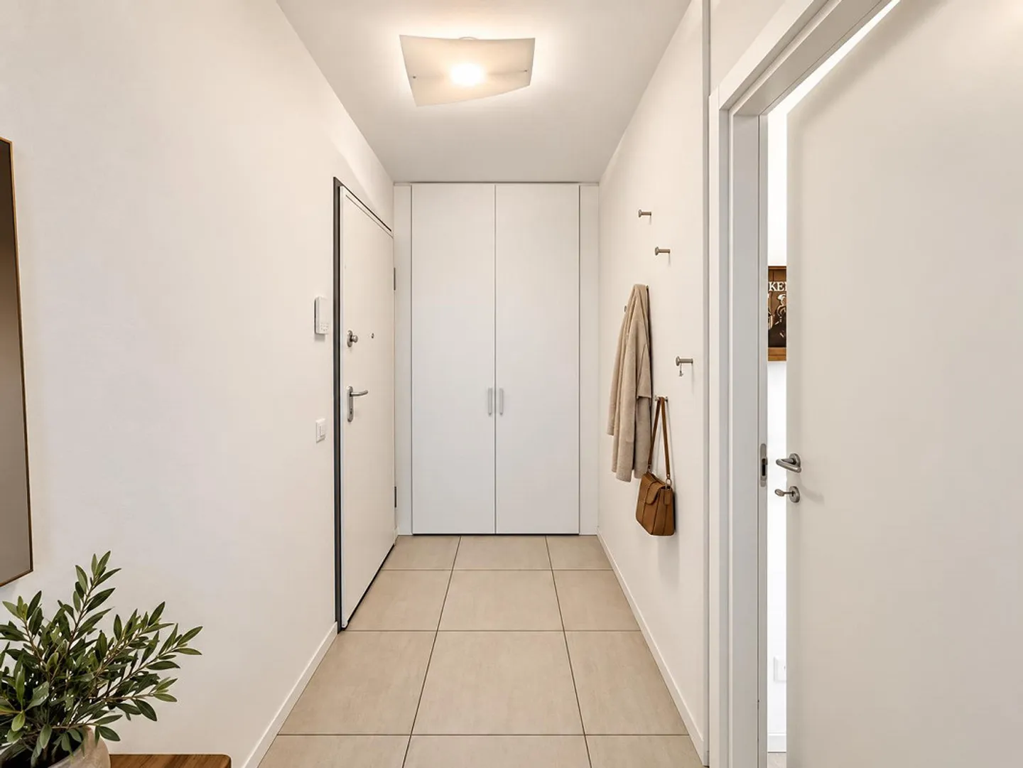 MENDRISIO | 2,5 PIÈCES AVEC VÉRANDA ET JARDIN PRIVÉ EN PLUS D'UN EMPLACEMENT DE PARKING DANS UN GARAGE - Photo 1 sur 20