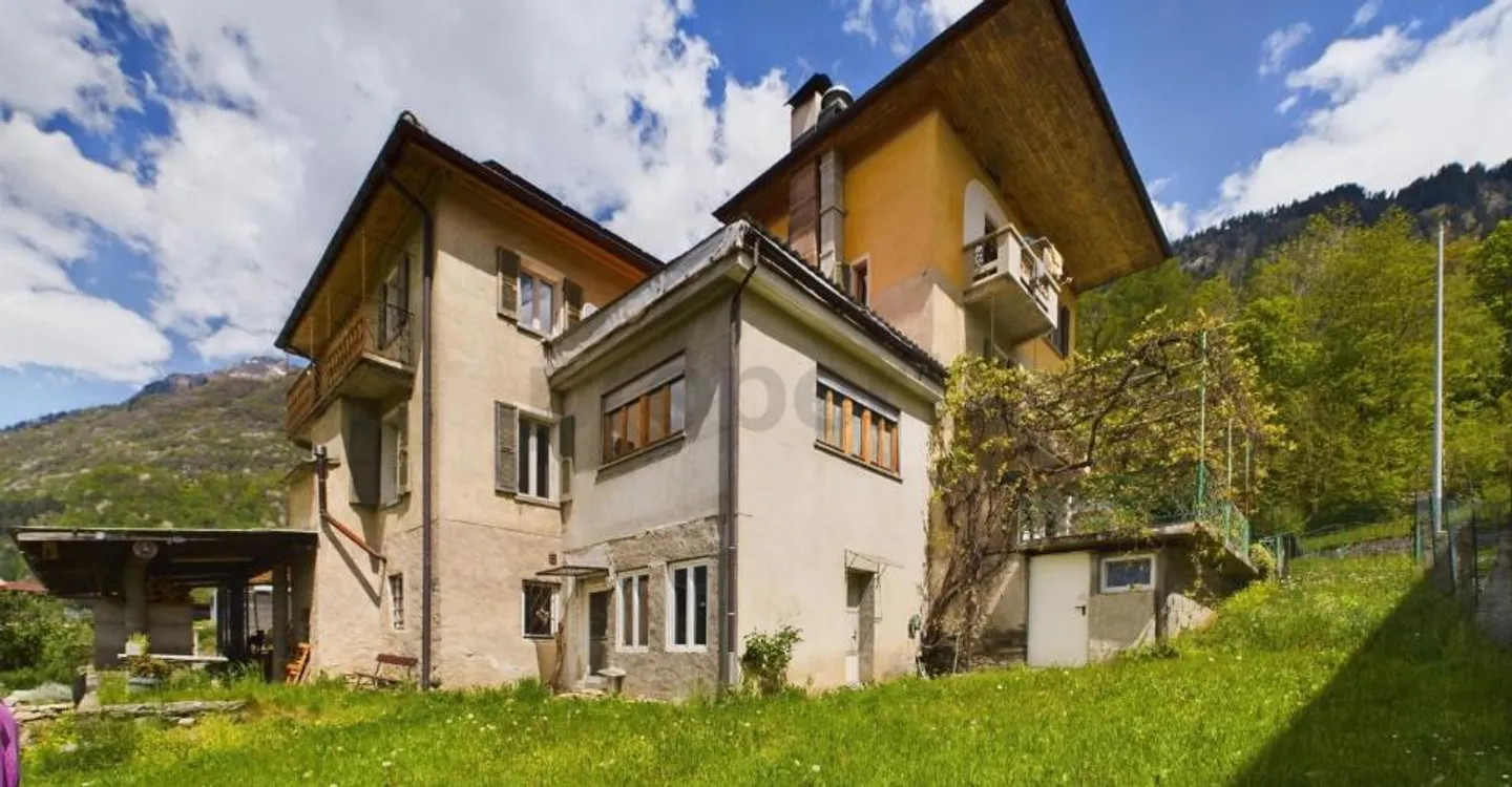Picturesque multi-family house with land in the heart of the Blenio Valley - Photo 1 of 10
