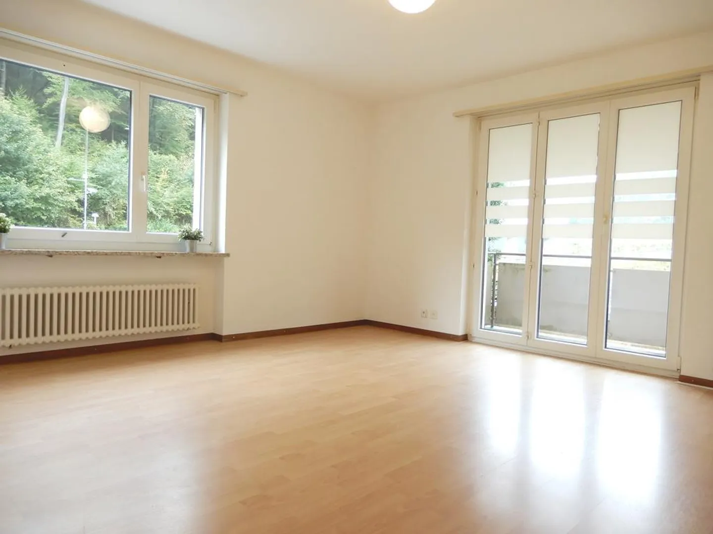 APPARTEMENT COSY AU REZ-DE-CHAUSSÉE - Photo 1 sur 8